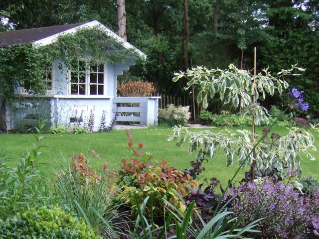 Traditional back garden with summerhouse