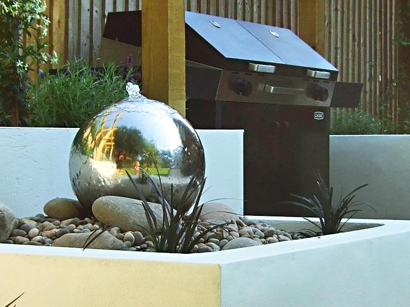 Stainless Steel Sphere Water Feature with Ophiopogon nigrescens