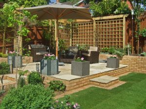 Raised sandstone paving with sun shade