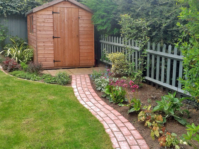 Simple running brick path to shed