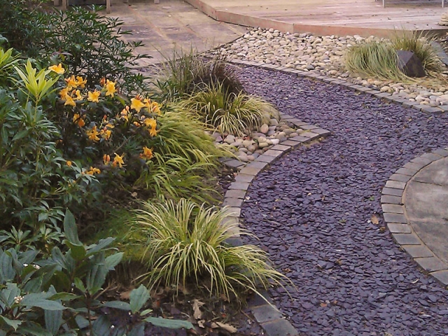 Path with plum slate chippings edged with sandstone setts