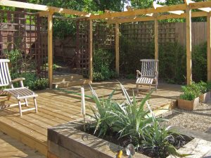 Pergola, deck and sleeper raised beds