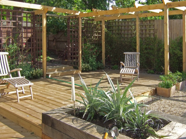 Pergola, deck and sleeper raised beds