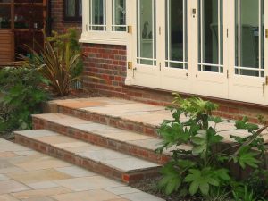 Sandstone steps with brick risers