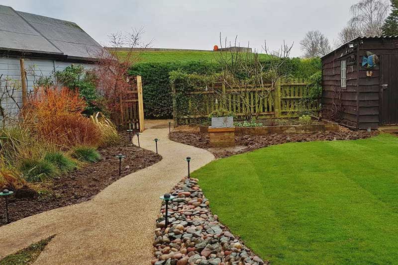 Resin path across garden provides improved access to the house boat