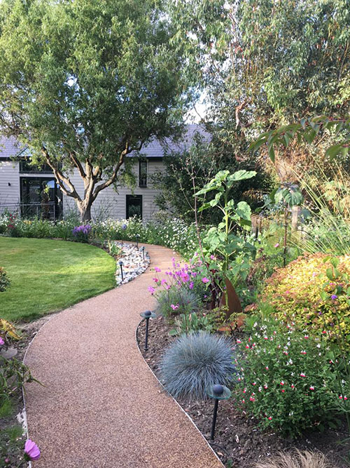 Resin path to a houseboat in the summer